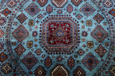 close up of hand knotted large gray mamluk afghan rug