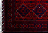 close up of hand knotted medium dark red khal mohammadi afghan rug