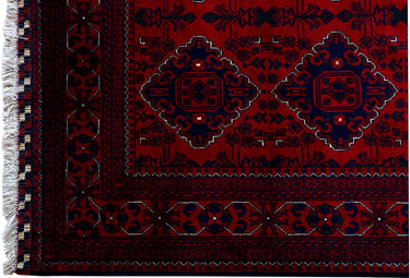 close up of hand knotted medium dark red khal mohammadi afghan rug