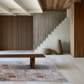 hand knotted large tan maroon bakhtiari afghan rug in a dining room